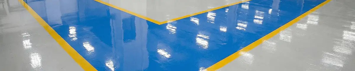 A factory floor professionally covered and marked with epoxy flooring in Nashville, TN