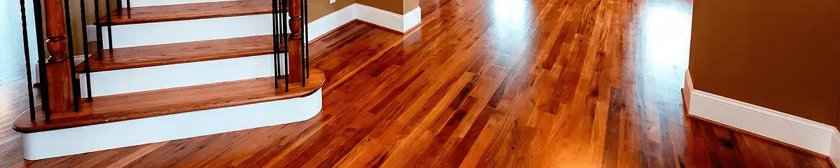 Base floor of a staircase with professionally restored wood flooring in Nashville TN
