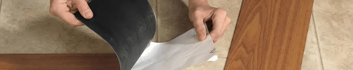 A professional installing vinyl flooring in Nashville, TN